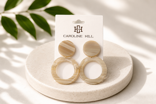 Bentlee Circle Drop Earrings in gray with round circle drop design on Caroline Hill display card