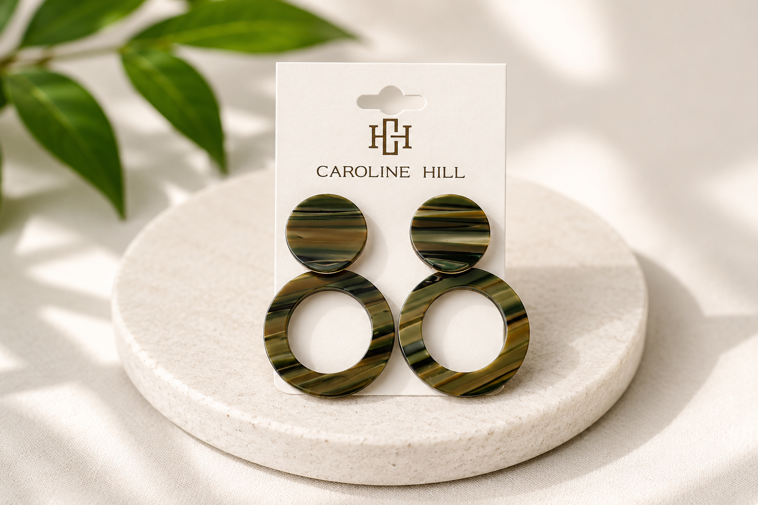 Bentlee Circle Drop Earrings in green with round circle drop design on Caroline Hill display card
