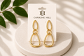 Edmond Dangle Gold Earrings on Caroline Hill display card