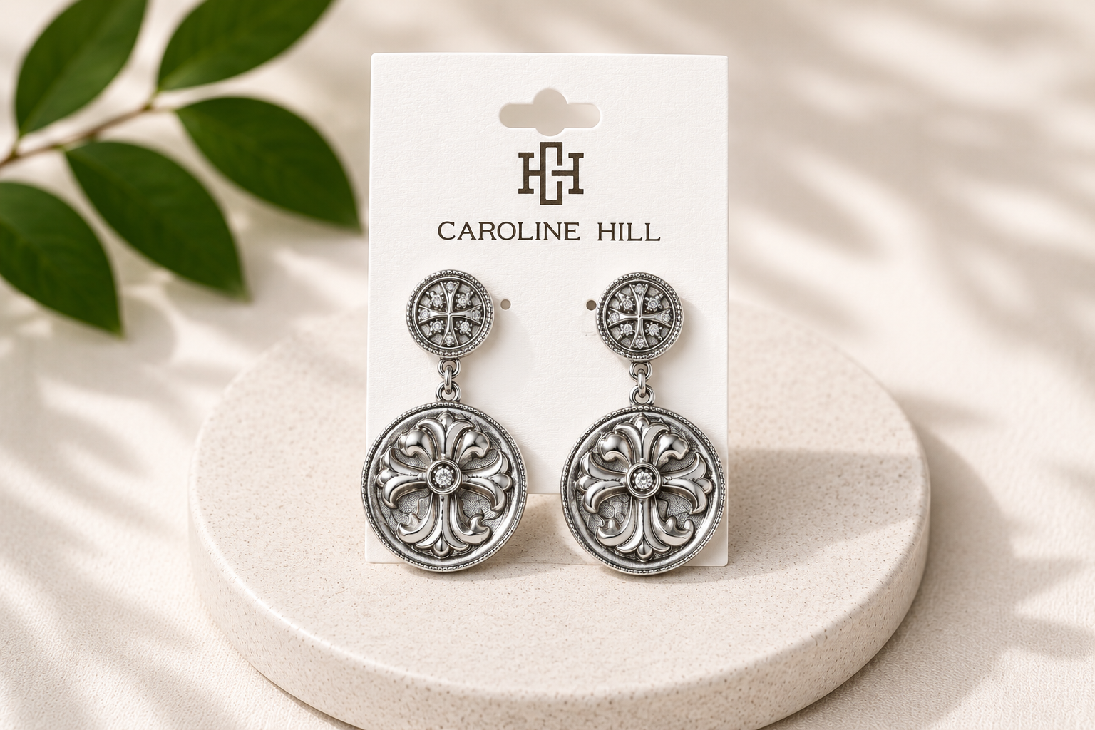 Sydney Cross Woven Silver Earrings on Caroline Hill display card
